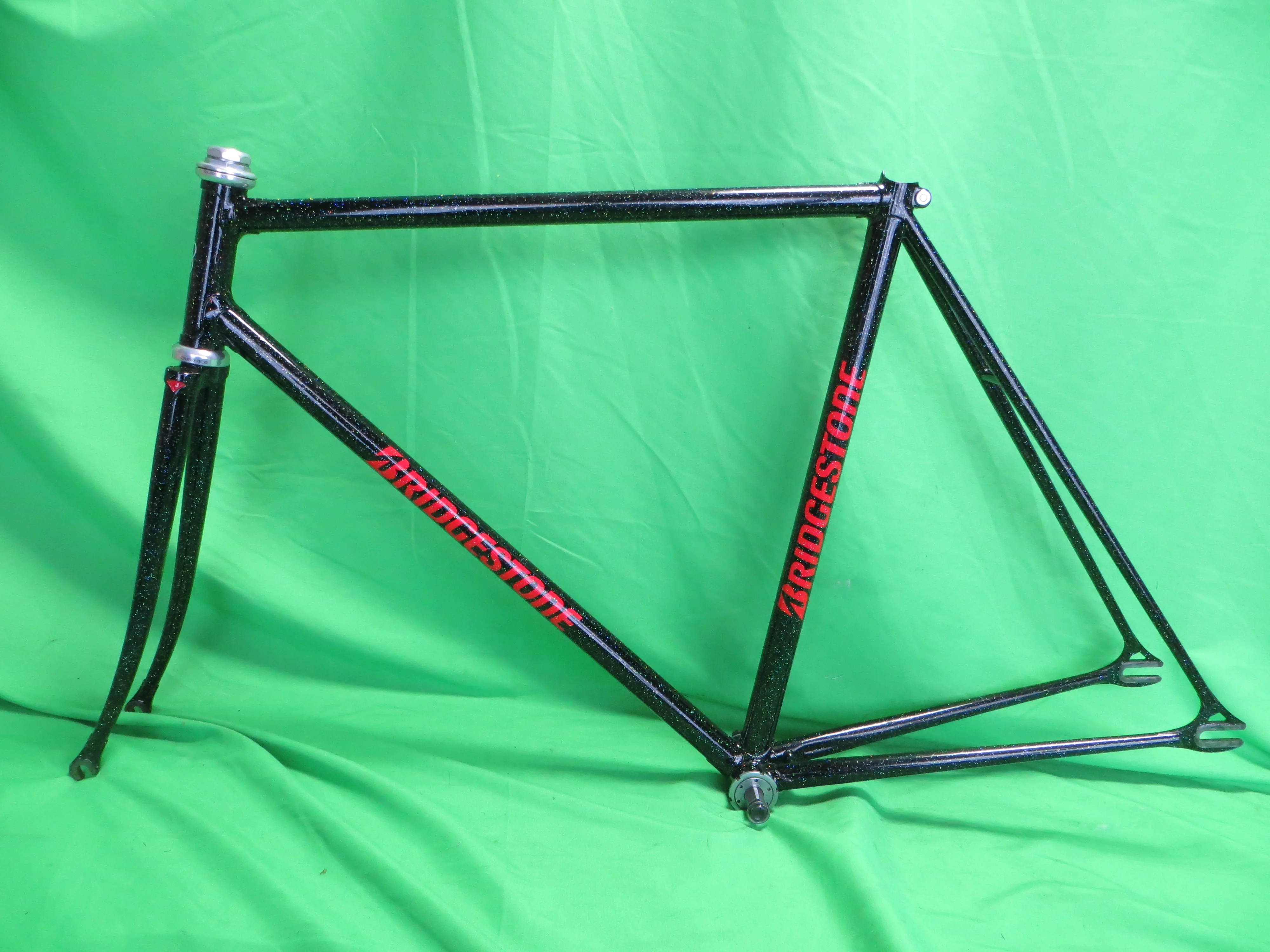 Bridgestone // Black with SUPER Rainboe Flake // 53.5cm
